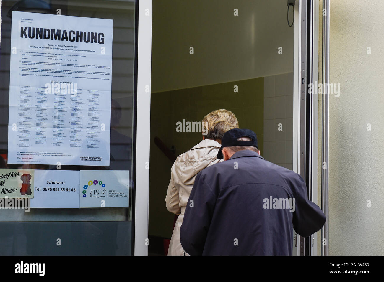 A couple arrive at a polling station to cast their votes during the Parliamentary elections. Stock Photo