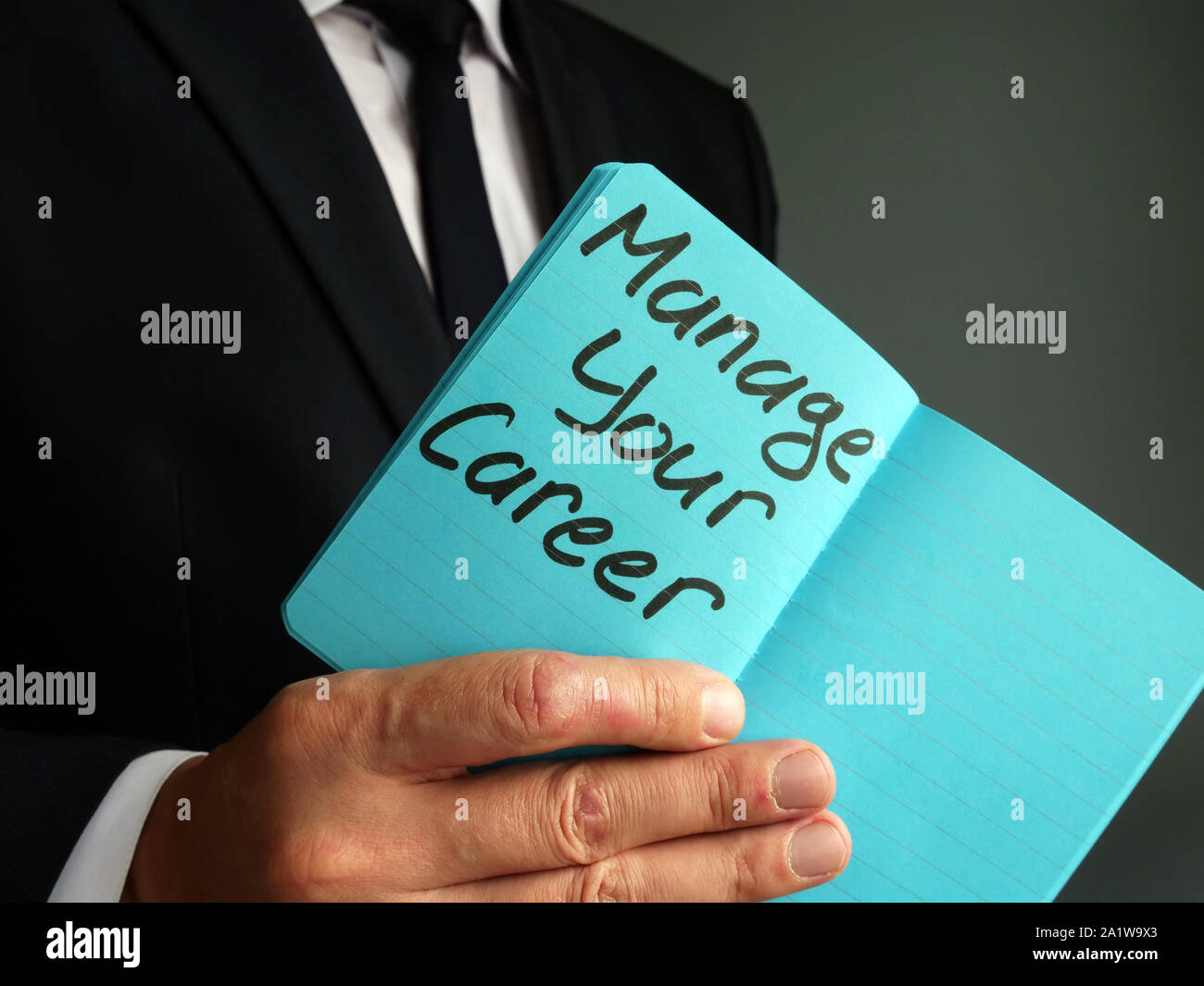 Manage your career handwritten on the page. Stock Photo