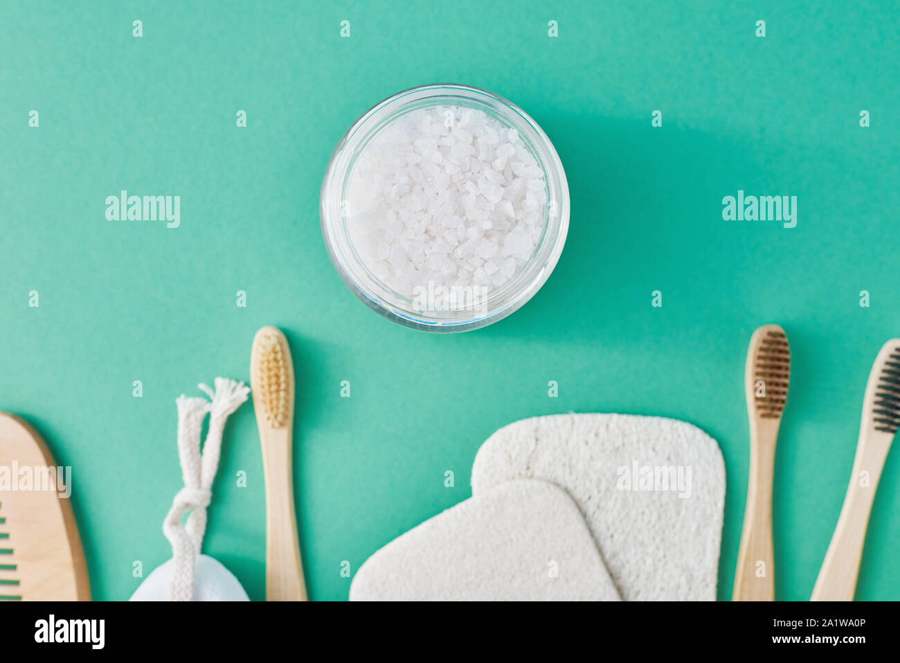 Body care products on green mint background, flat lay top view with ...