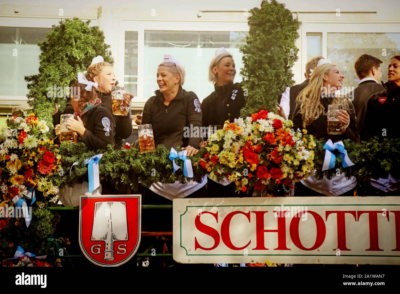 MUNICH, GERMANY - SEPTEMBER 22, 2019 Grand entry of the Oktoberfest landlords and breweries, festive parade of magnificent decorated carriages and ban Stock Photo