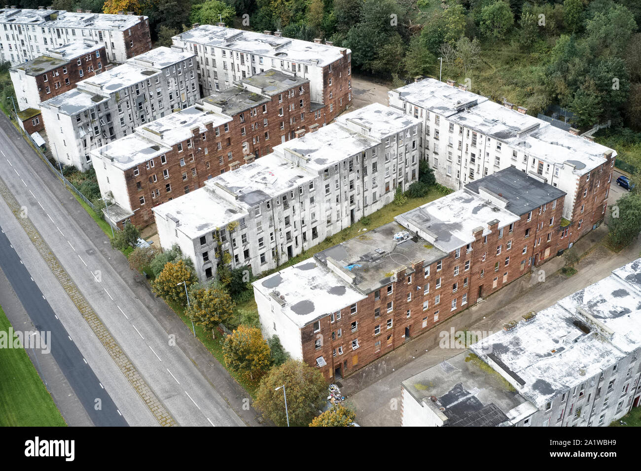 Derelict council house in poor housing crisis ghetto estate slum in Port Glasgow uk Stock Photo