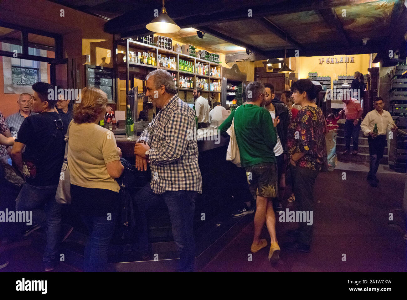 Customers at a traditional cider bar in the old town in Gijon,Asturias