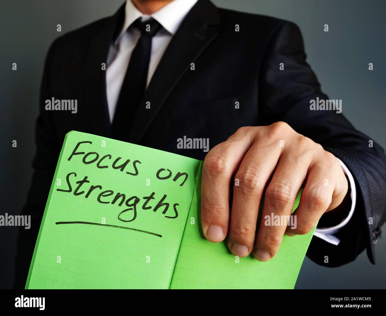 Focus on Strengths sign in the green notebook. Stock Photo