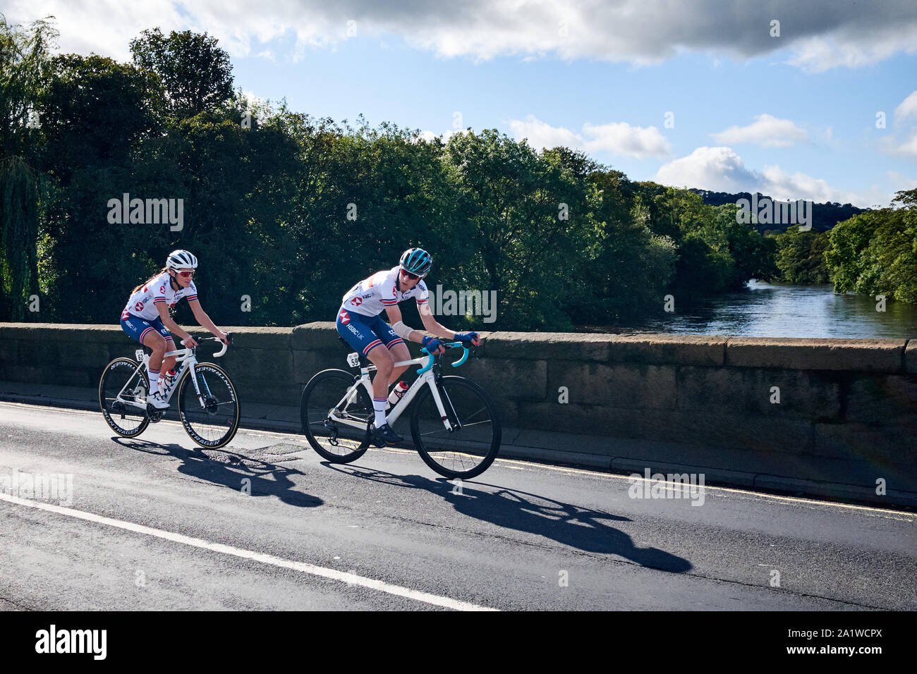 Otley, Yorkshire / UK - September 28th 2019: Lizzie Deignan passes over the river Wharfe, Otley in the UCI Road World Championships 2019 Women's race Stock Photo
