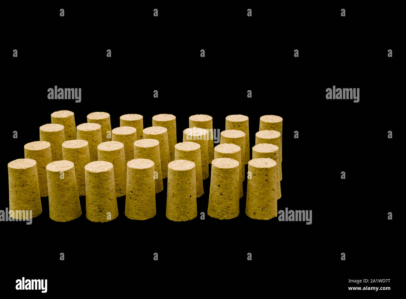 Cork bottle corks in a row on a black background Stock Photo Alamy