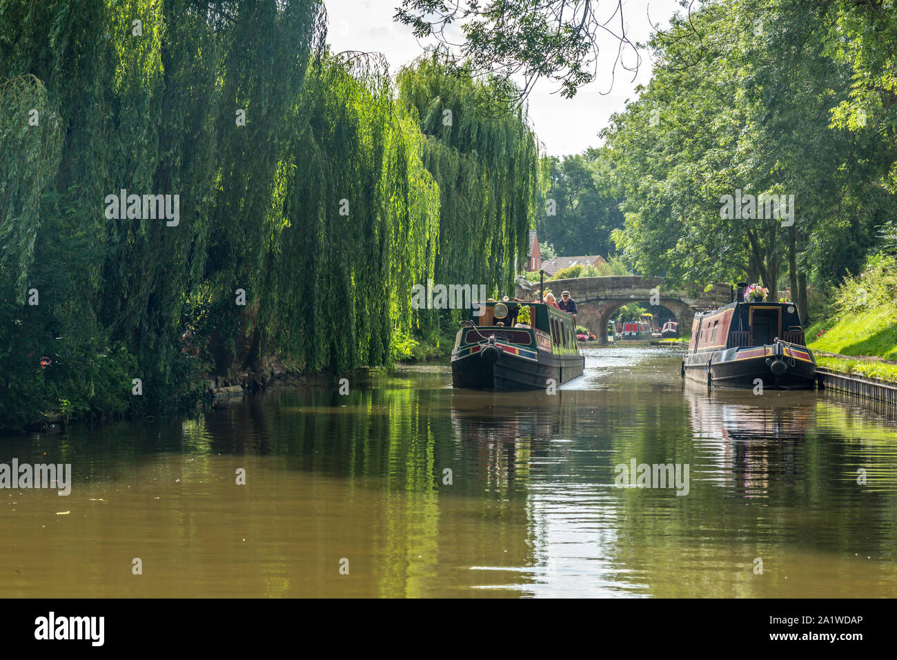Narrow Boats, or Barges, on The Shropshire Union Canal in England. Stock Photo