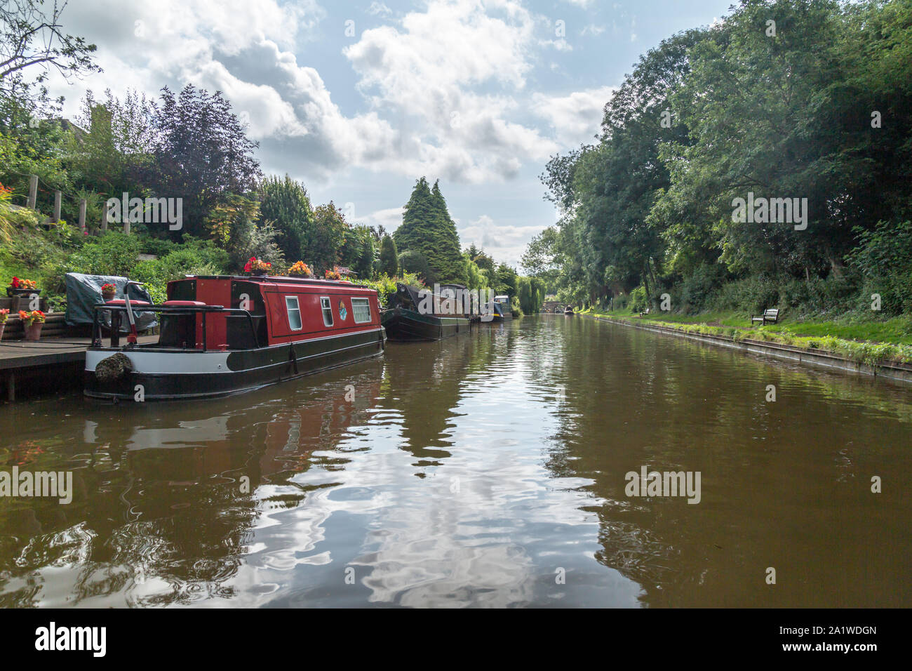 Narrow Boats, or Barges, moored up on The Shropshire Union Canal in England. Stock Photo