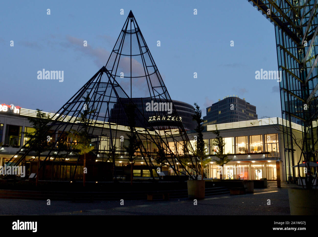 BERLIN, GERMANY - 18 SEPTEMBER 2019  The retail and office development Kranzler Eck is built behind the famous Cafe Kranzler to a design by Helmut Jah Stock Photo