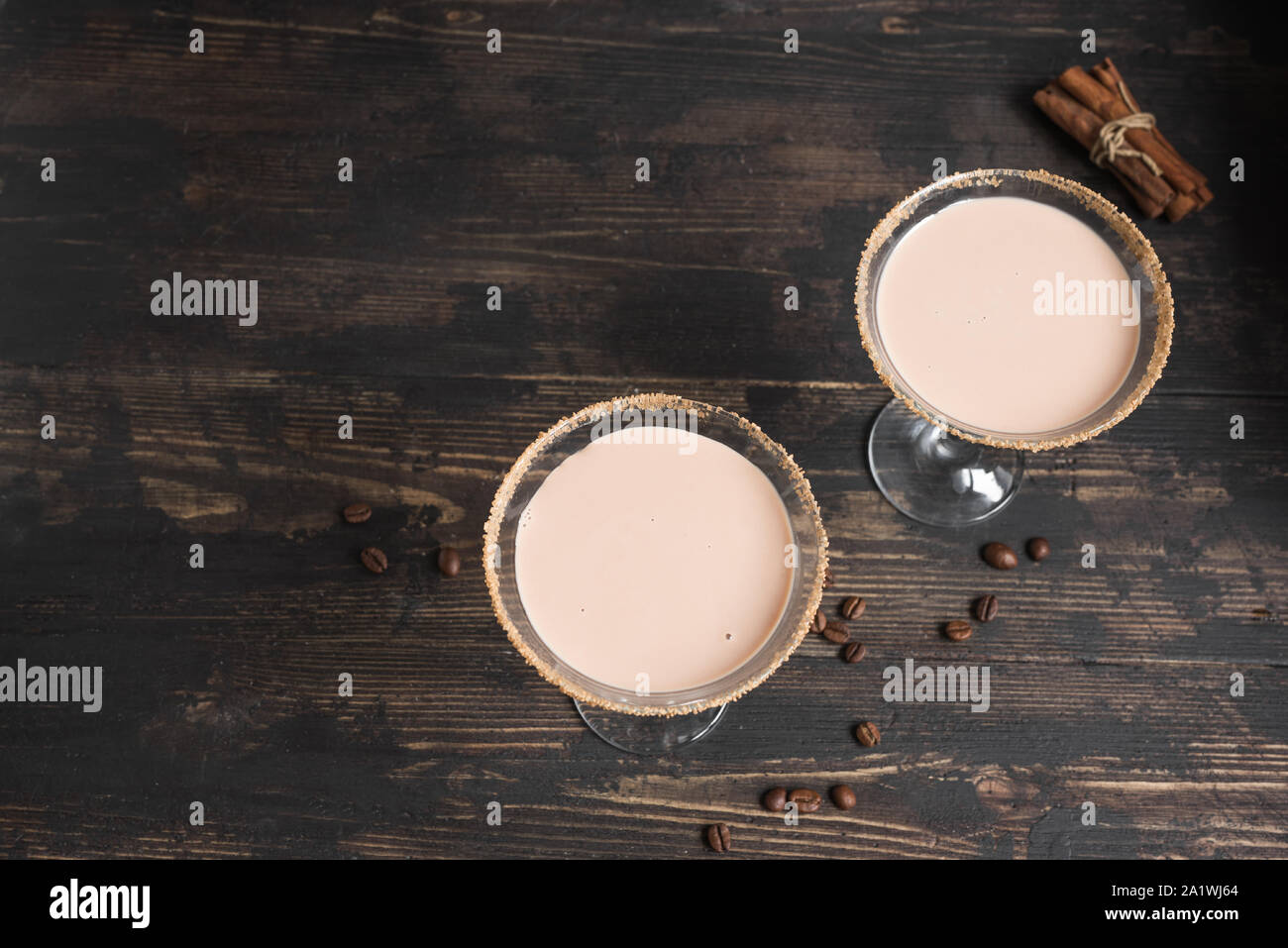 Espresso Martini Cocktail or irish cream liquor in glasses on rustic