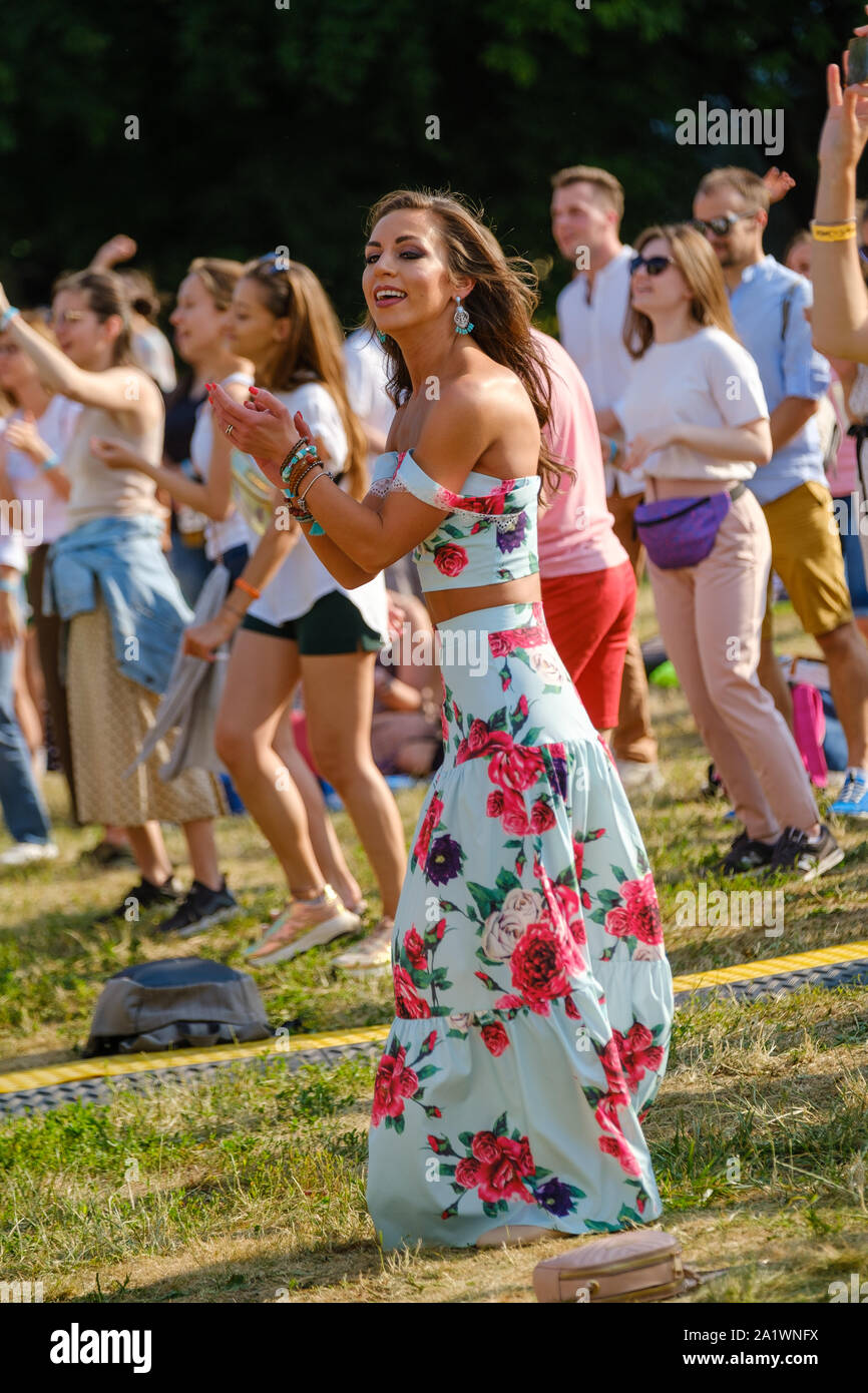 Young woman dancing at open air music festival Stock Photo - Alamy