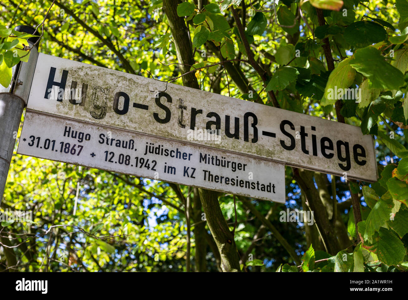 D-Luedinghausen, Stever, Muensterland, Westphalia, North Rhine-Westphalia, NRW, Old Jewish cemetery, street sign Hugo Strauss Stiege, weathered, desolate, untended, dilapidated, in memory of Hugo Strauss, Jewish citizen, 1942 murdered in the concentration camp KZ Theresienstadt by the Nazis Stock Photo