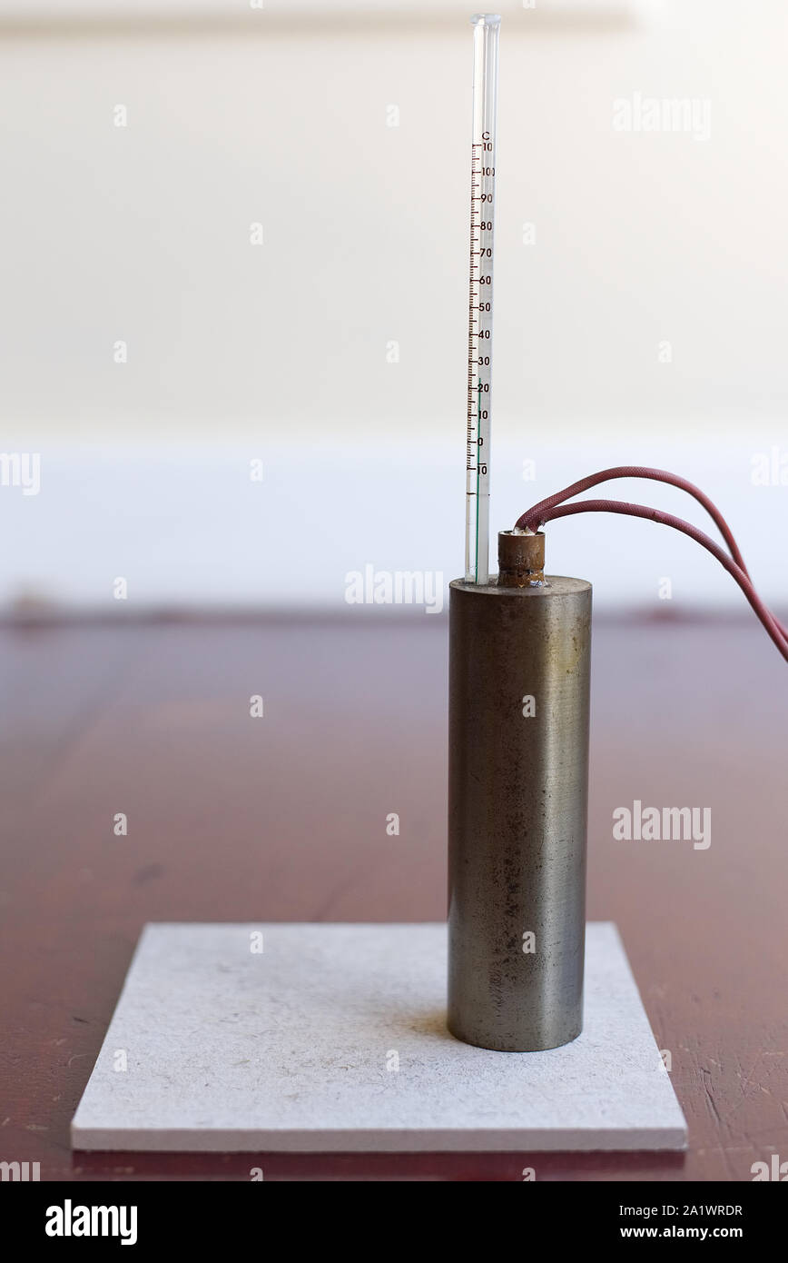 Specific Heat Capacity of Steel Experiment Set up with no insulation. Steel block with an