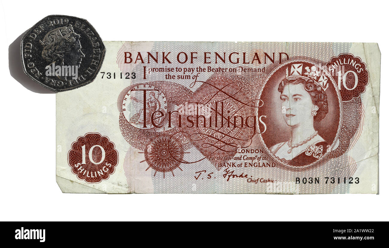 Ten Shilling note replaced by 50 New Pence piece 14 October 1969 - 50th Anniversary Stock Photo