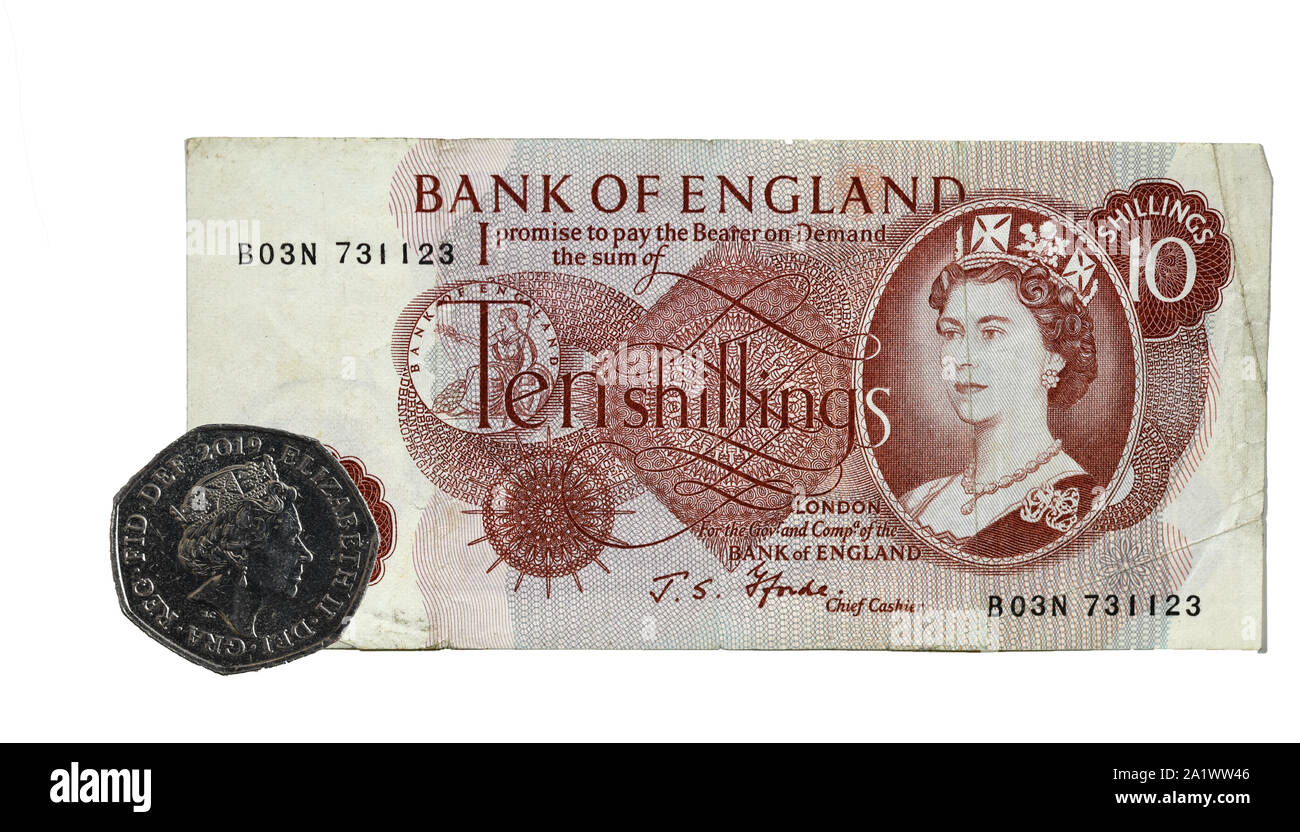 Ten Shilling note replaced by 50 New Pence piece 14 October 1969 - 50th Anniversary Stock Photo