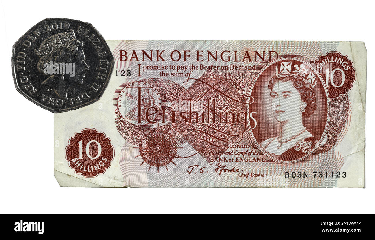 Ten Shilling note replaced by 50 New Pence piece 14 October 1969 - 50th Anniversary Stock Photo