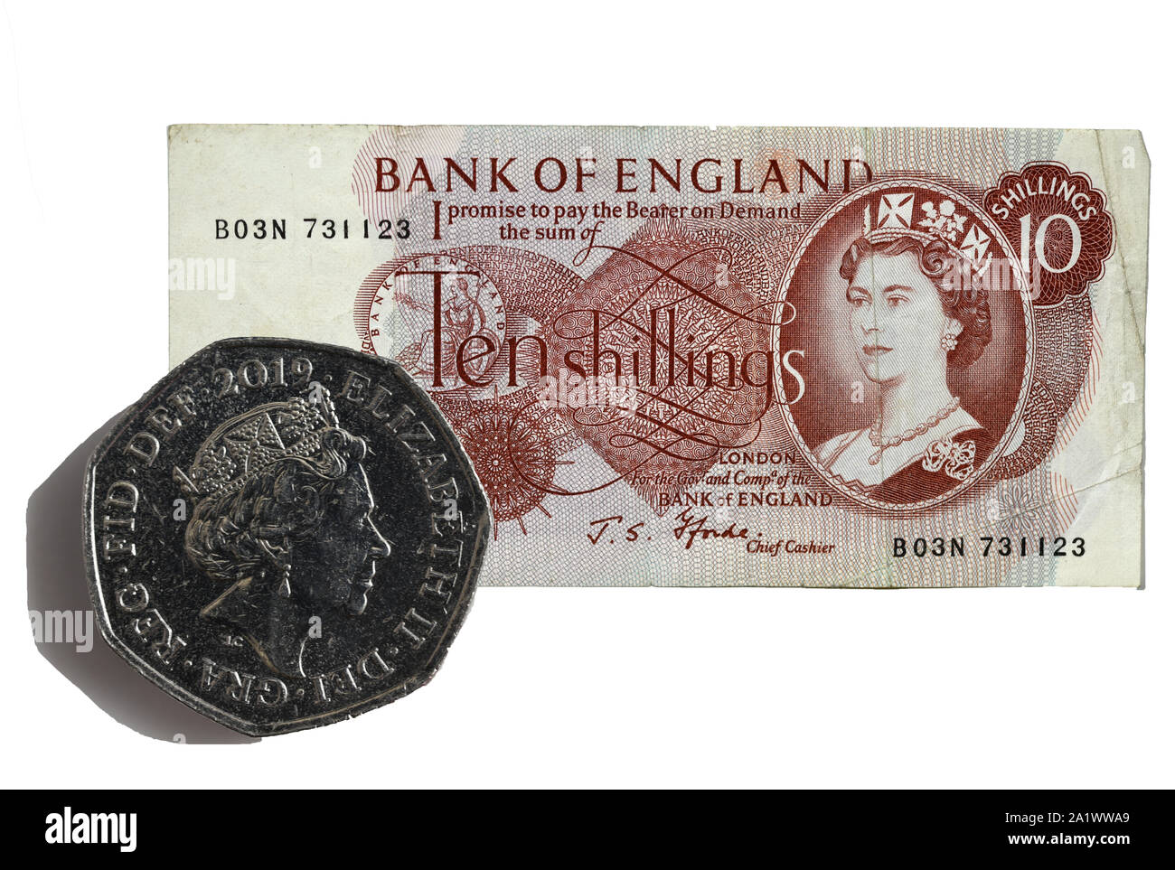 Ten Shilling note replaced by 50 New Pence piece 14 October 1969 - 50th Anniversary Stock Photo