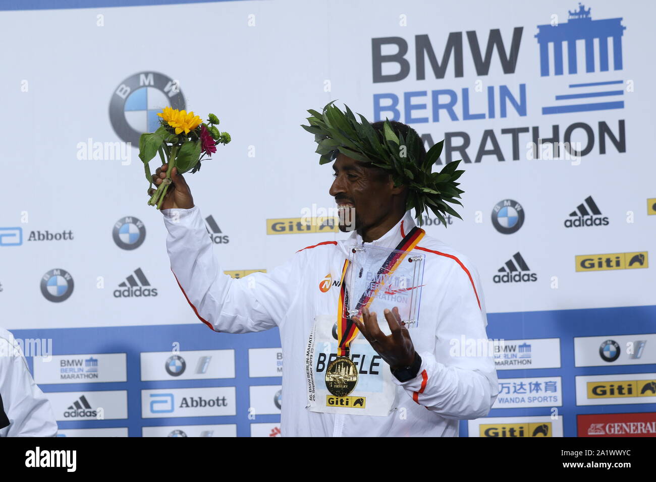 09/19/2019, Berlin, Germany,Kenenisa Bekele at the award ceremony. Kenenisa Bekele from Ethiopia wins the 46th Berlin Marathon in 02:01:41 hours. Birhanu Legese (2:02:48) wins the second place and Sisay Lemma (2:03:36) comes in third place. Stock Photo