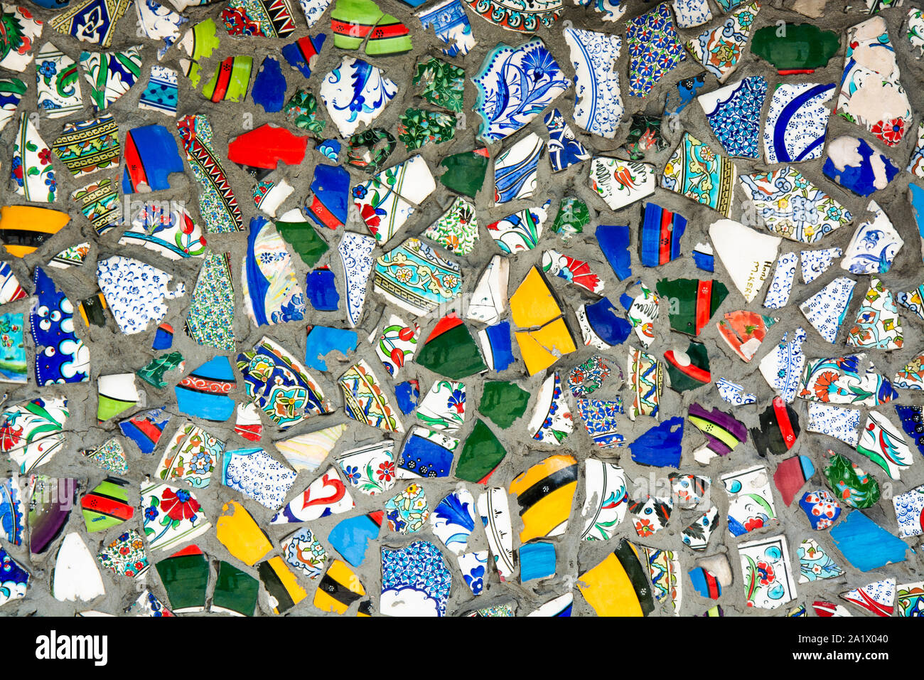 Multicolor mosaic wall decorative ornament from ceramic broken tile Stock Photo