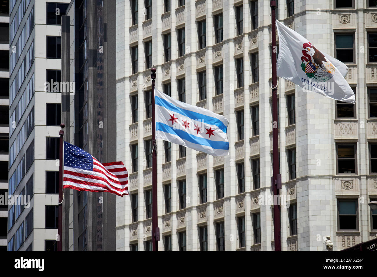 us chicago city and illinois state flags flying in downtown chicago in the windy city chicago illinois united states of america Stock Photo