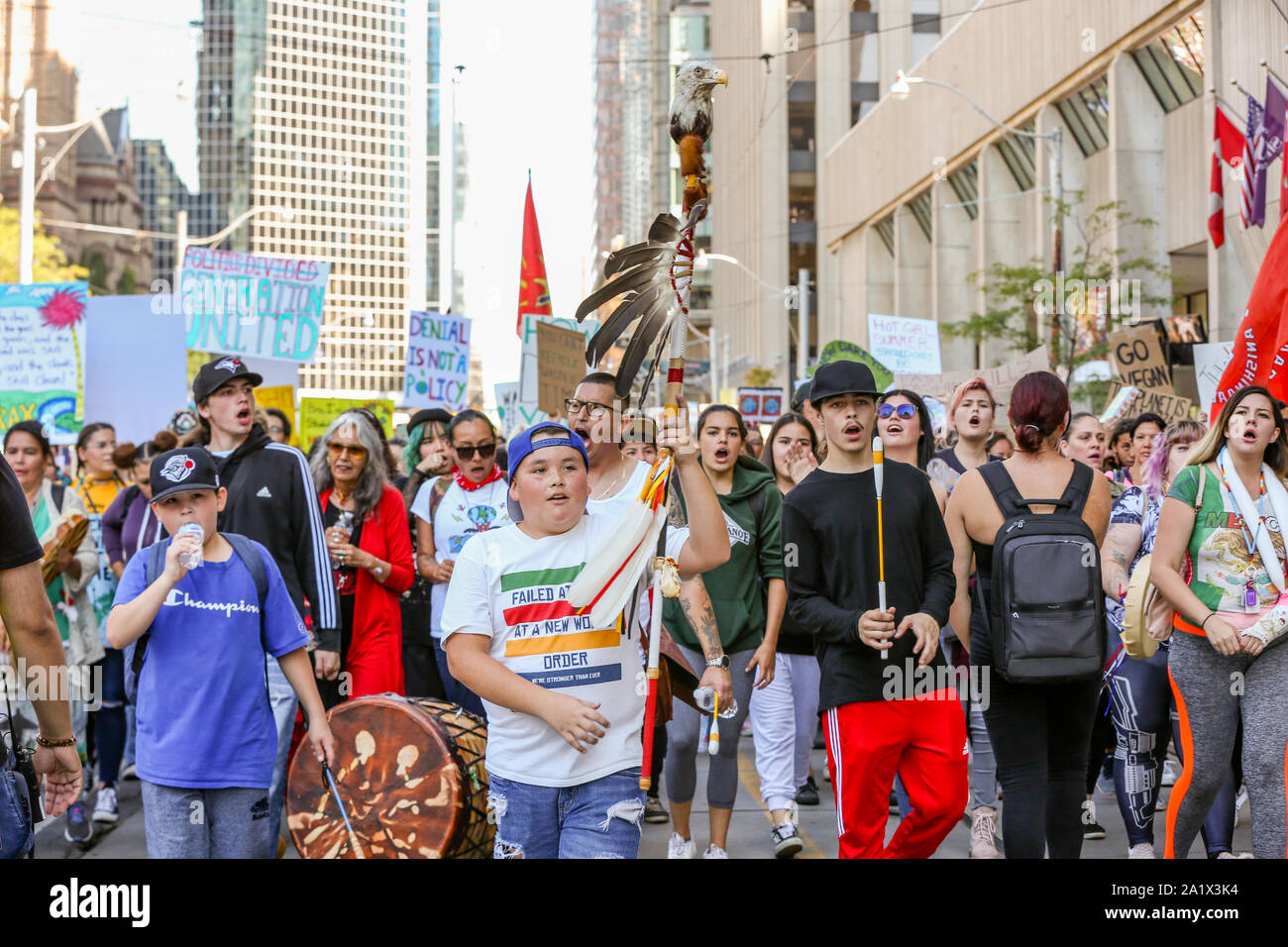 TORONTO, ONTARIO, CANADA - SEPTEMBER 27, 2019: 'Fridays for Future' climate change protest. Thousands of people march with signs. Stock Photo