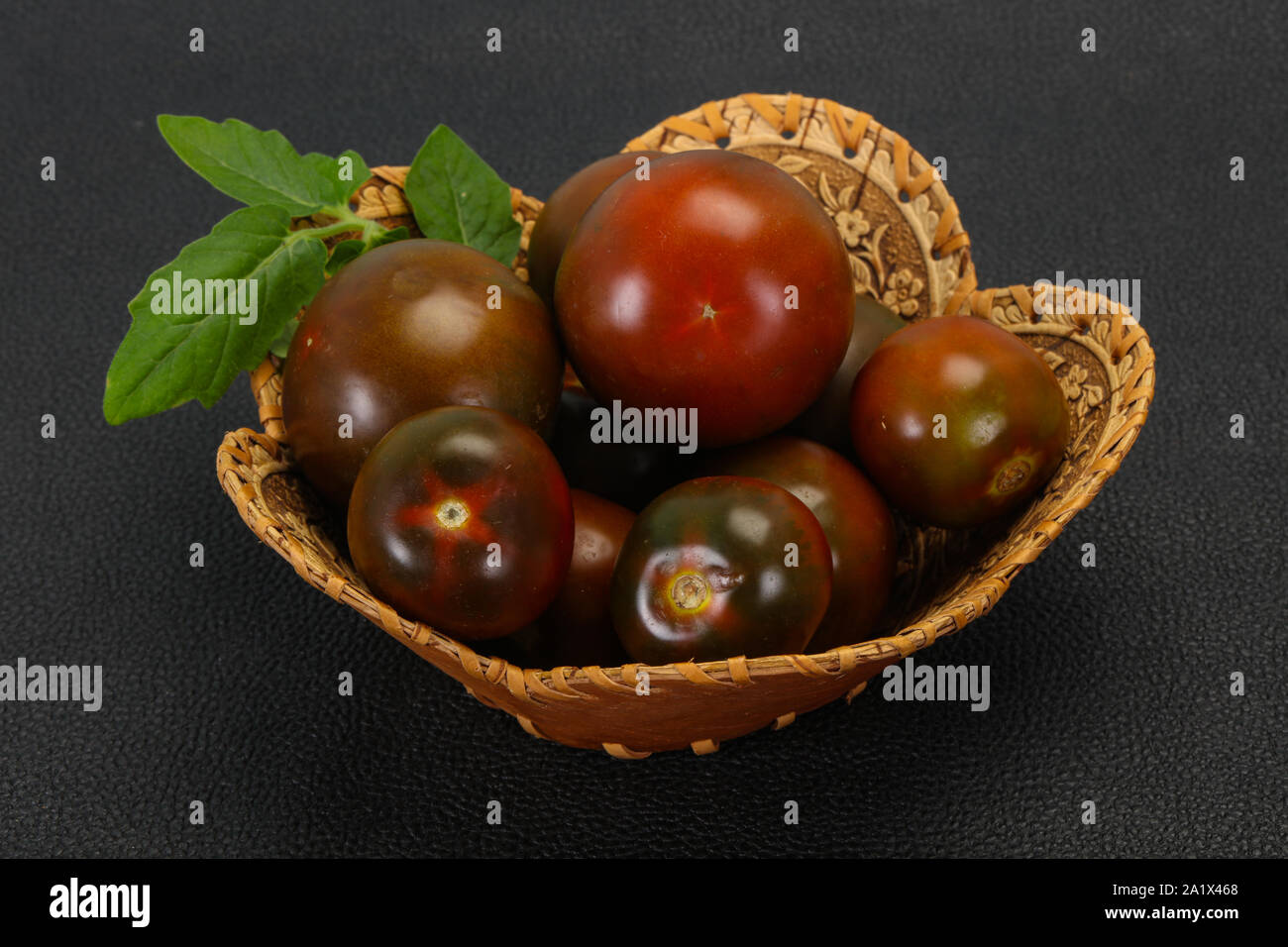 Black tomato tasty fresh ripe Kumato Stock Photo Alamy