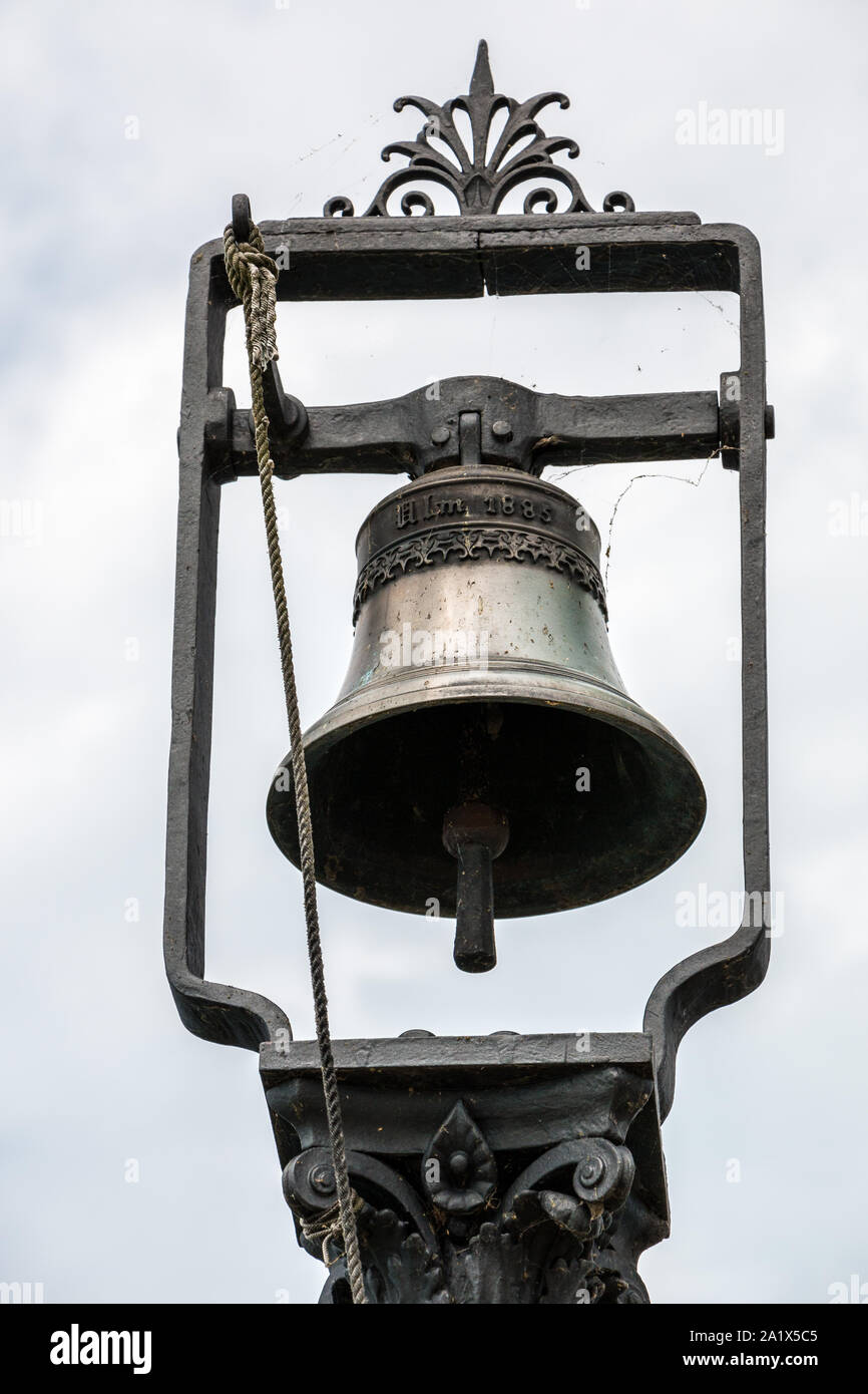 Bell made of steel at the harbor Stock Photo