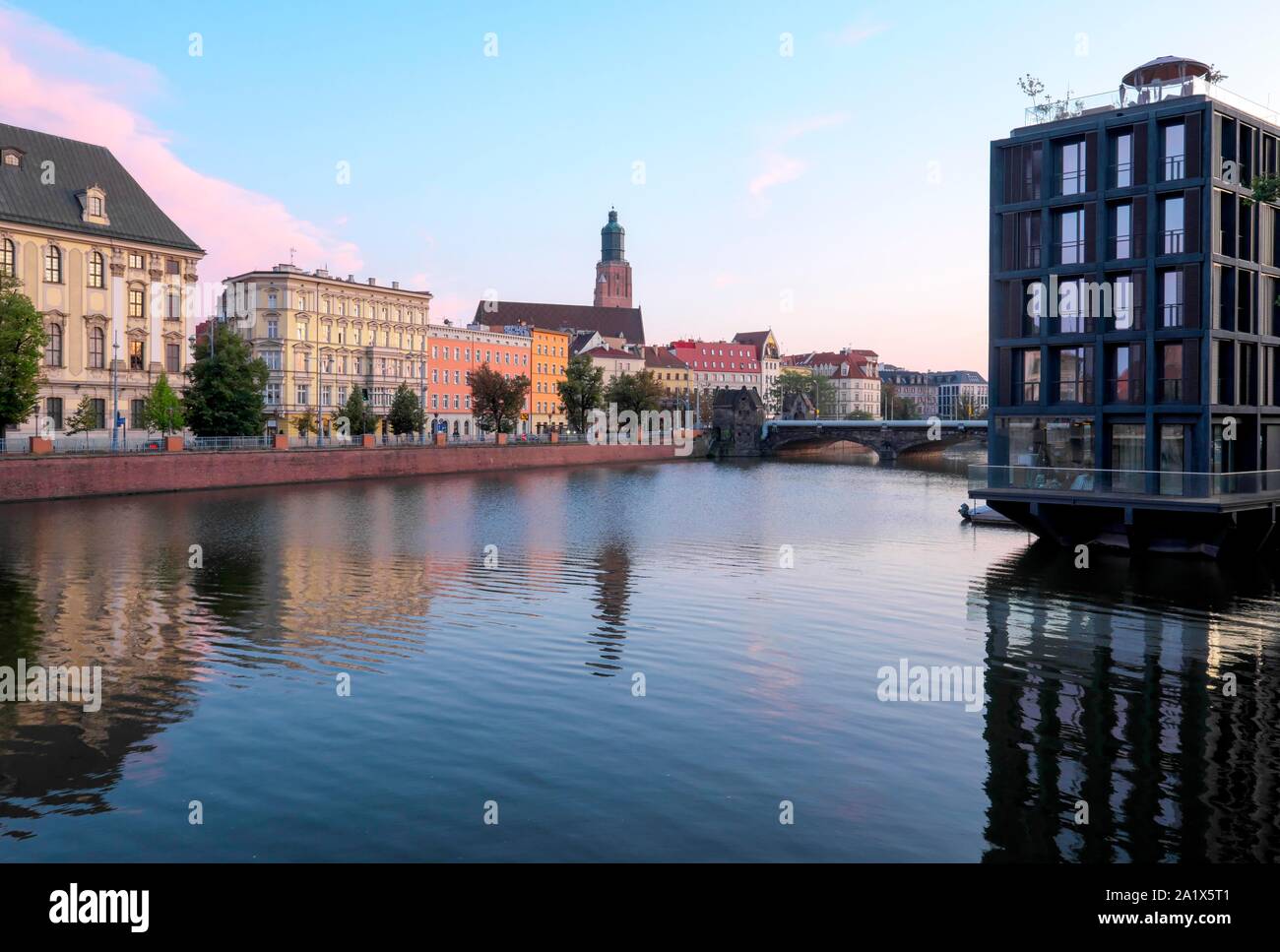 Evening atmosphere on the Oder River, Elisabeth Church in the background, Wroclaw, Poland Stock Photo