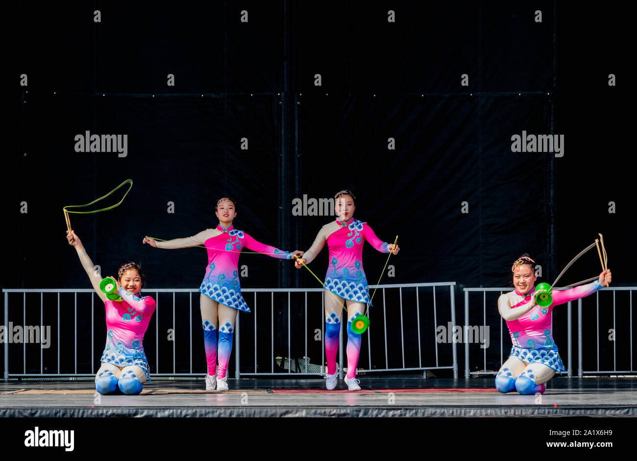 Doswell, Virginia, USA — September 27, 2019. A troupe of Chinese acrobats perform on the main stage at the Virginia State fair. Stock Photo