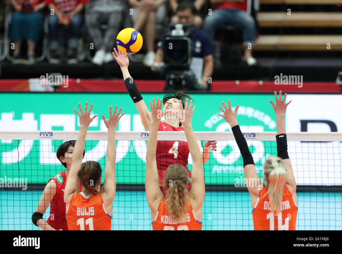 Osaka, Japan. 29th Sep, 2019. Risa Shinnabe (top) of Japan spikes the ball during a round robin match against the Netherlands at the 2019 FIVB Volleyball Women's World Cup in Osaka, Japan, Sept. 29, 2019. Credit: Du Xiaoyi/Xinhua/Alamy Live News Stock Photo