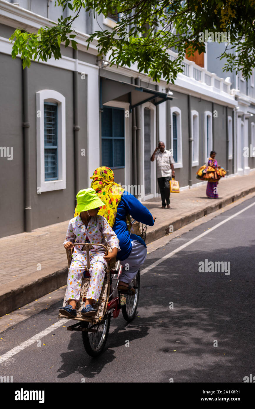 White Town, Pondicherry/India- September 3 2019: Locals going about their days work in the French quarter of Pondicherry in India Stock Photo