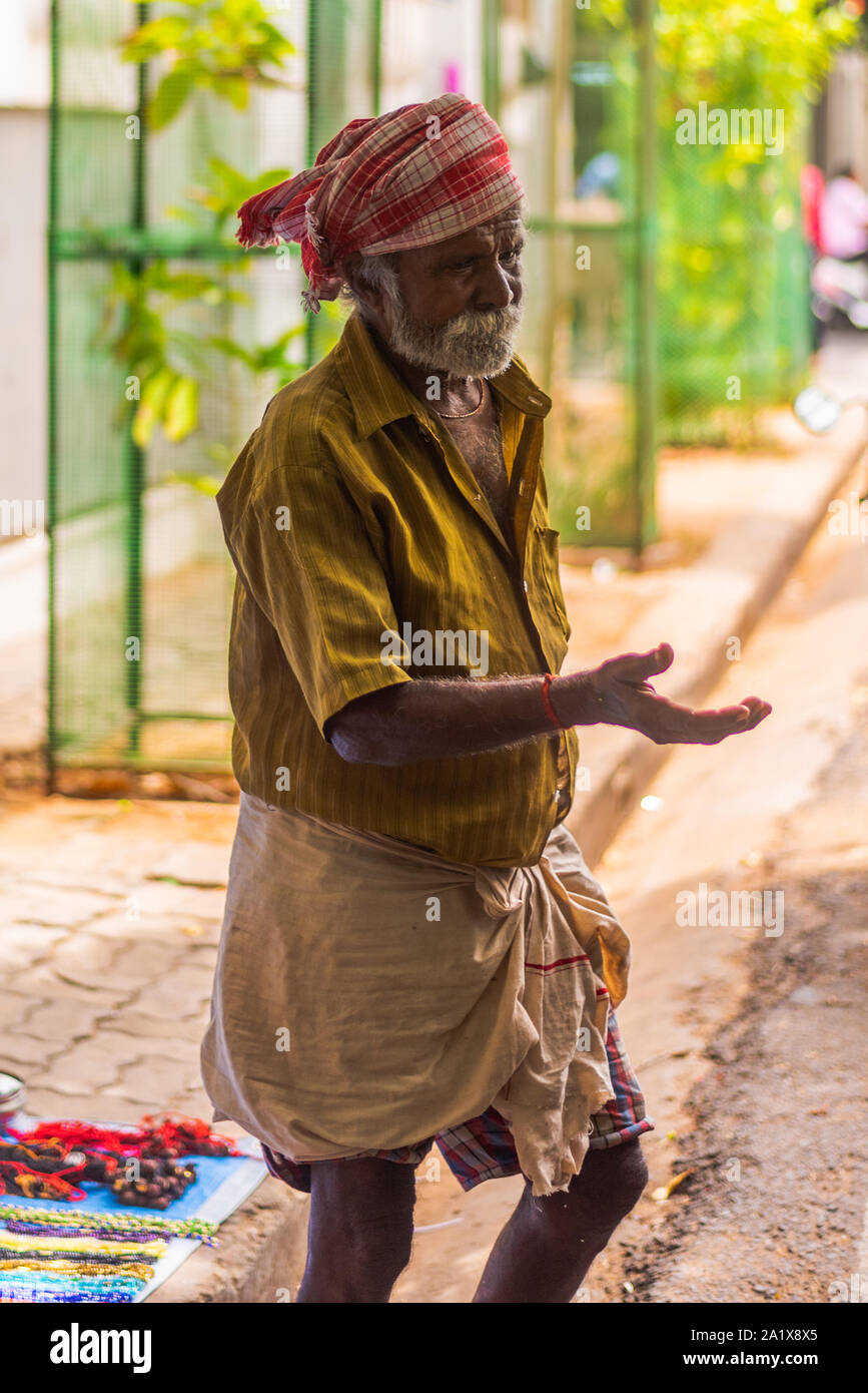 White Town, Pondicherry/India- September 3 2019: Locals going about their days work in the French quarter of Pondicherry in India Stock Photo