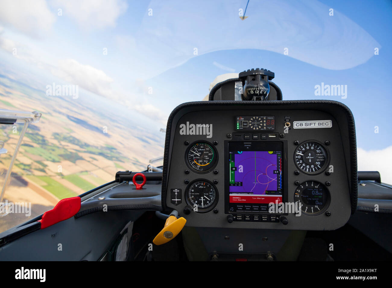 Duo Discus glider sailplane view of instruments from the back rear seat. Colour map display, altimeter, ASI, variometer, FLARM, compass Stock Photo