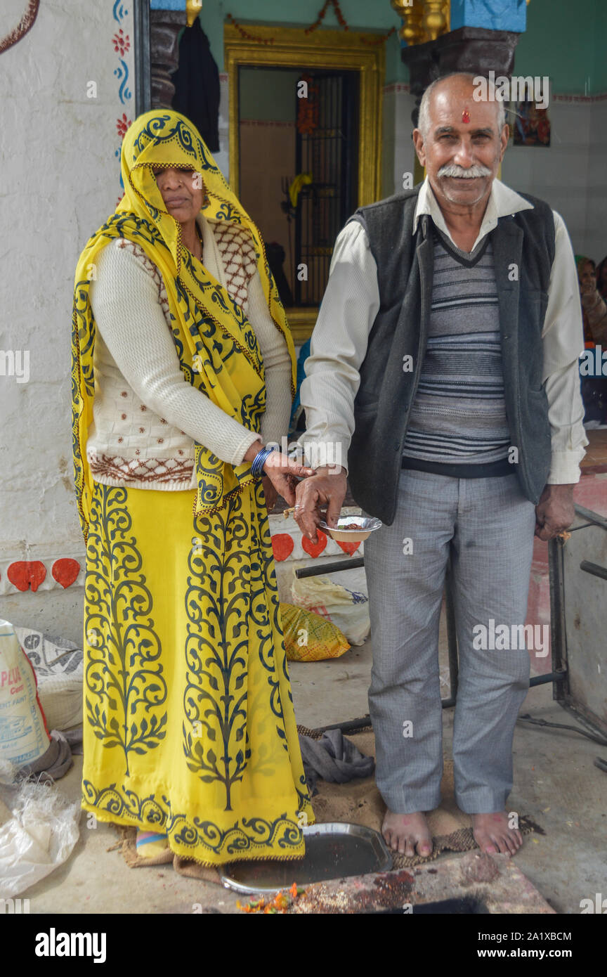 Indian villager couple doing praying for rain because of water crises. Stock Photo