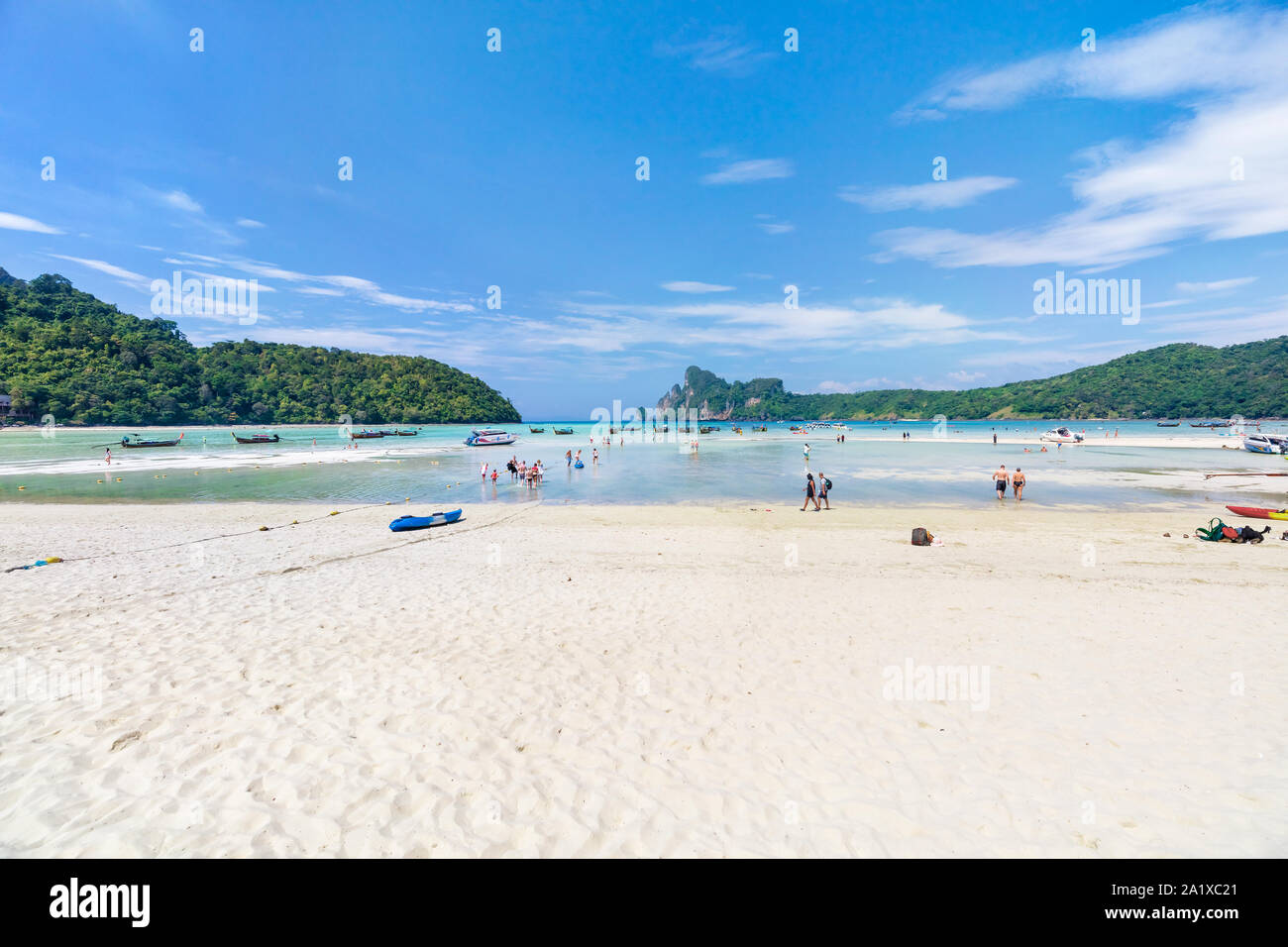 Asian tropical Loh Dalum beach paradise in Thailand with boats and people Stock Photo