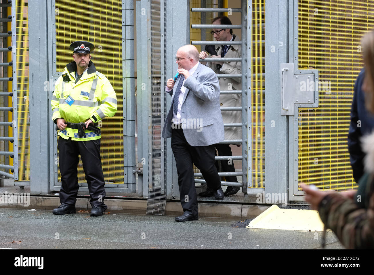 Manchester, UK.  Sunday 29th September 2019.  Delegates leave the inner secure zone outside the Conservative Party Conference on the opening day of the Tory event.  Photo Steven May / Alamy Live News Stock Photo