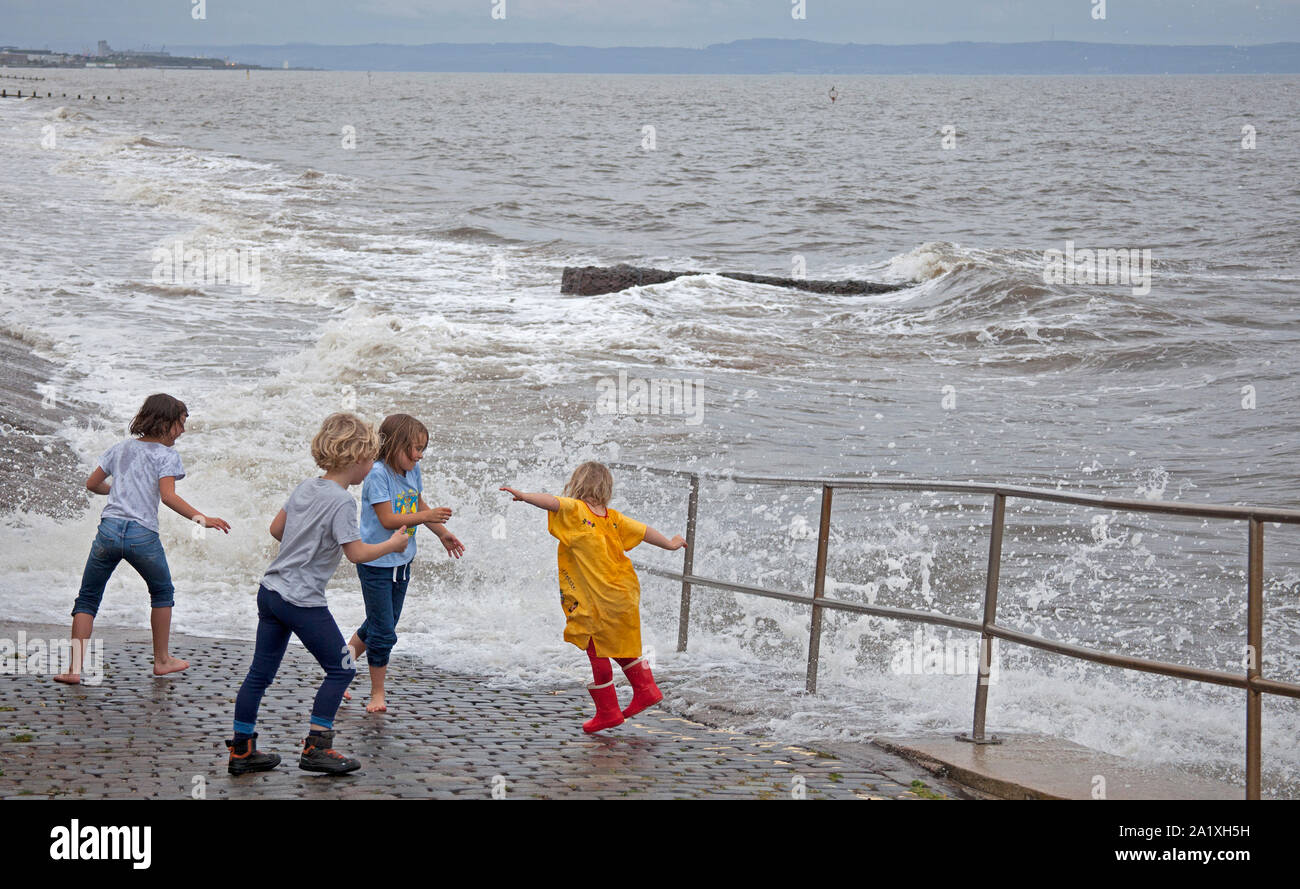 High Tide waves at Portobello, esplanade, Edinburgh, Scotland, UK Stock