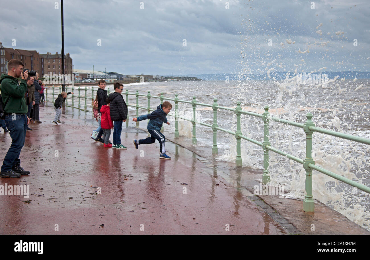 High Tide waves at Portobello, esplanade, Edinburgh, Scotland, UK Stock