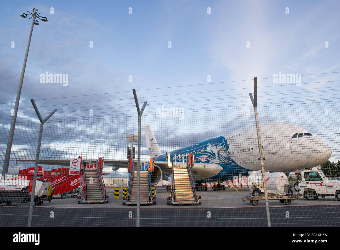 Glasgow, UK. 28 September 2019.  Pictured: Hi Fly Super Jumbo Airbus A380-800 seen on the tarmac awaiting refuelling before going to pick up more stranded passengers. Following the immediate fallout from the collapsed tour company Thomas Cook, Operation Matterhorn is still in full swing at Glasgow Airport. The grounded and impounded Thomas Cook aircraft have been moved to a quieter part of the airfield to make way for the wide body fleet needed for operation Matterhorn. Colin Fisher/CDFIMAGES.COM Stock Photo