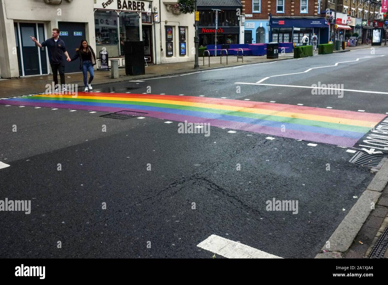 Rainbow pedestrian crossing in Wimbledon, London. Stock Photo