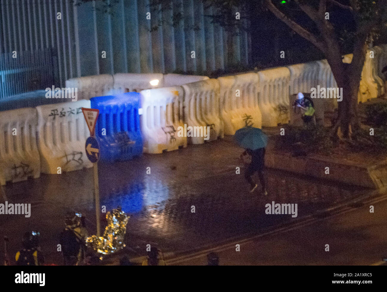 Hong Kong, 28 Sep 2019 - A rioter was throwing a petrol bomb in Hong Kong government house. Stock Photo