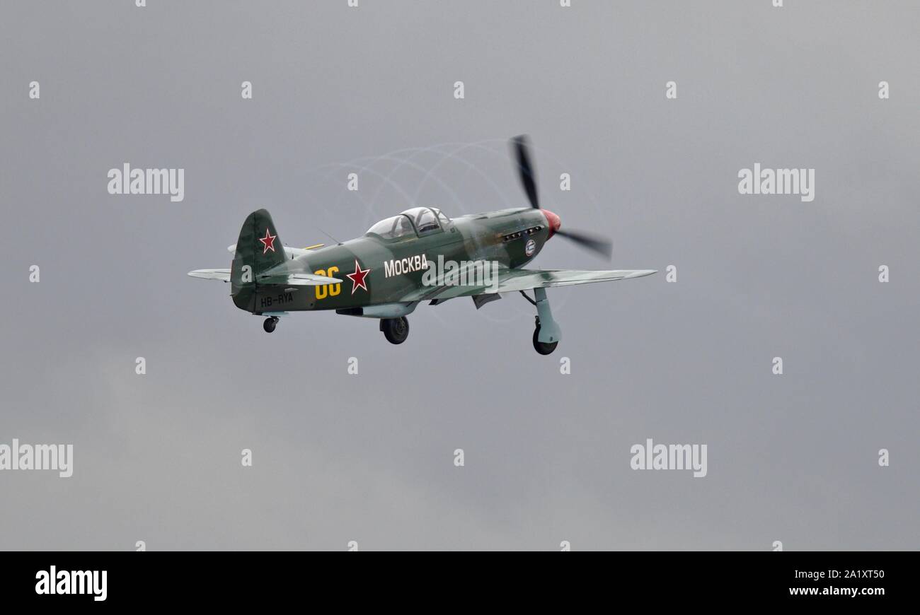 Yakovlev Yak-3UA (HB-RYA) taking off at the Battle of Britain airshow at Duxford on the 22 September 2019 producing propeller tip vortex condensation Stock Photo