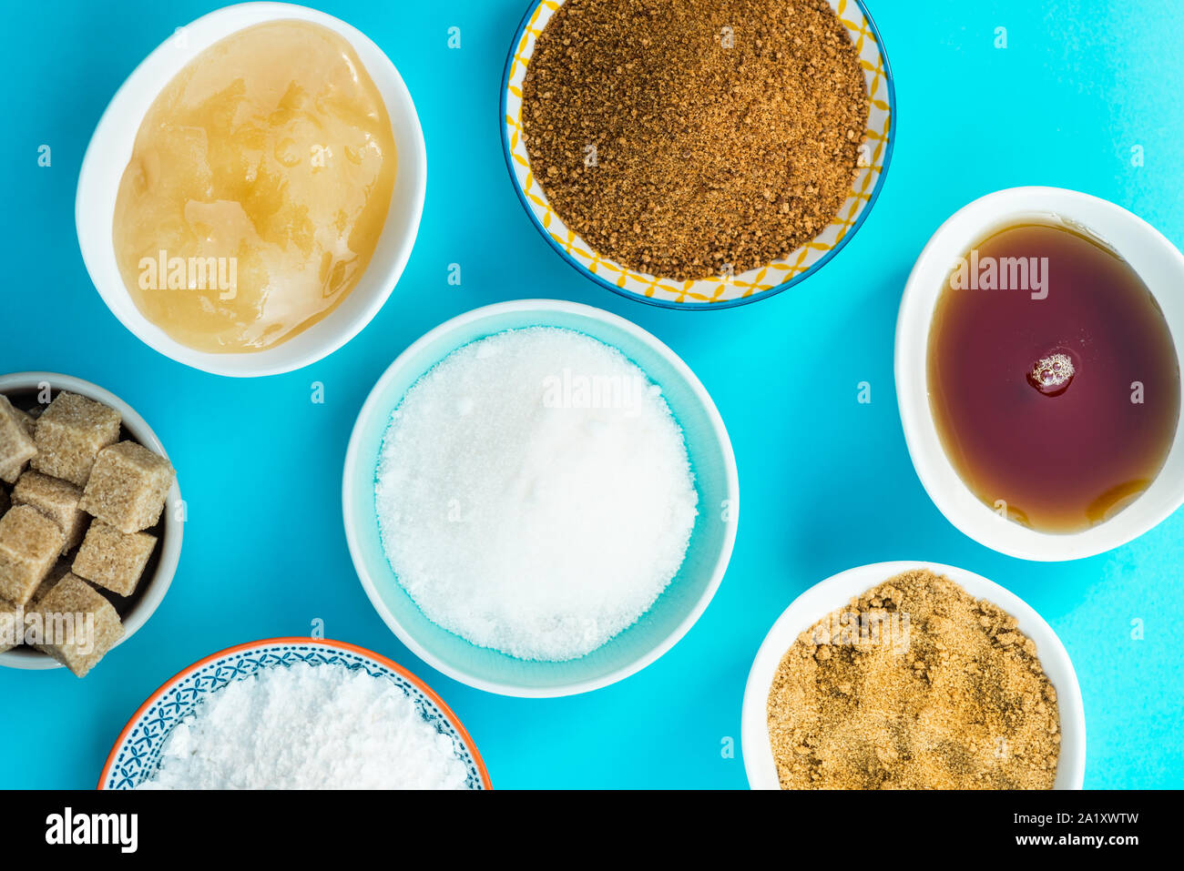 Different Kinds of Sugar and Sweeteners in the Bowls, such as coconut
