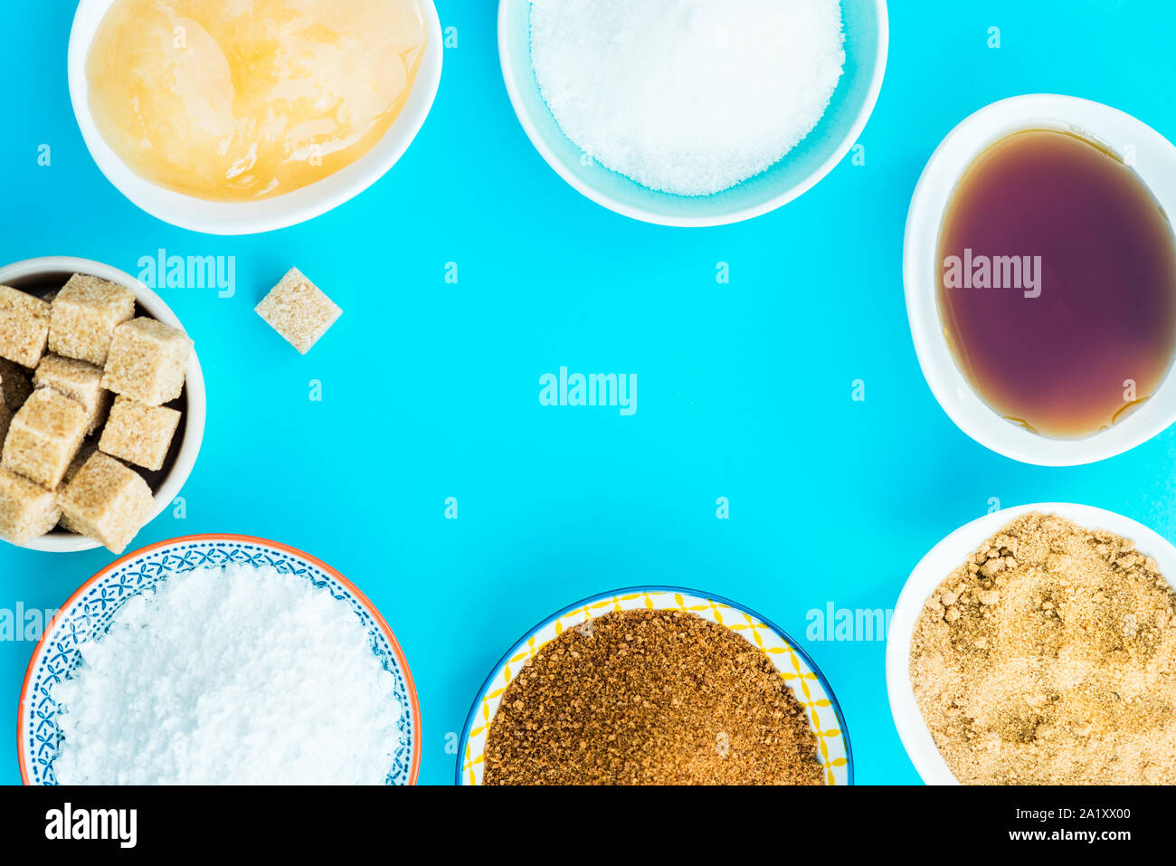 Different Kinds of Sugar and Sweeteners in the Bowls, such as coconut