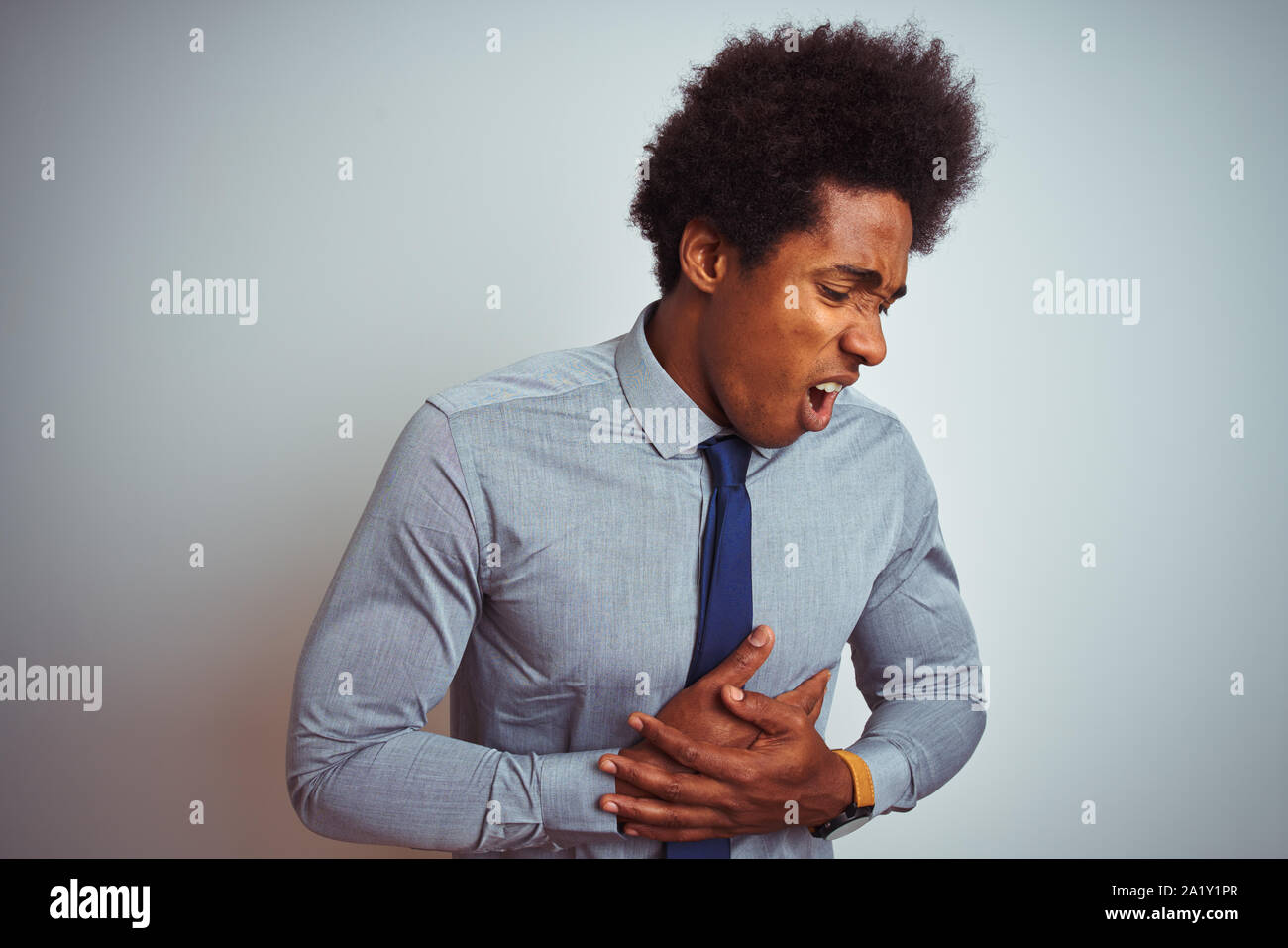 American Business Man With Afro Hair Wearing Shirt And Tie Over