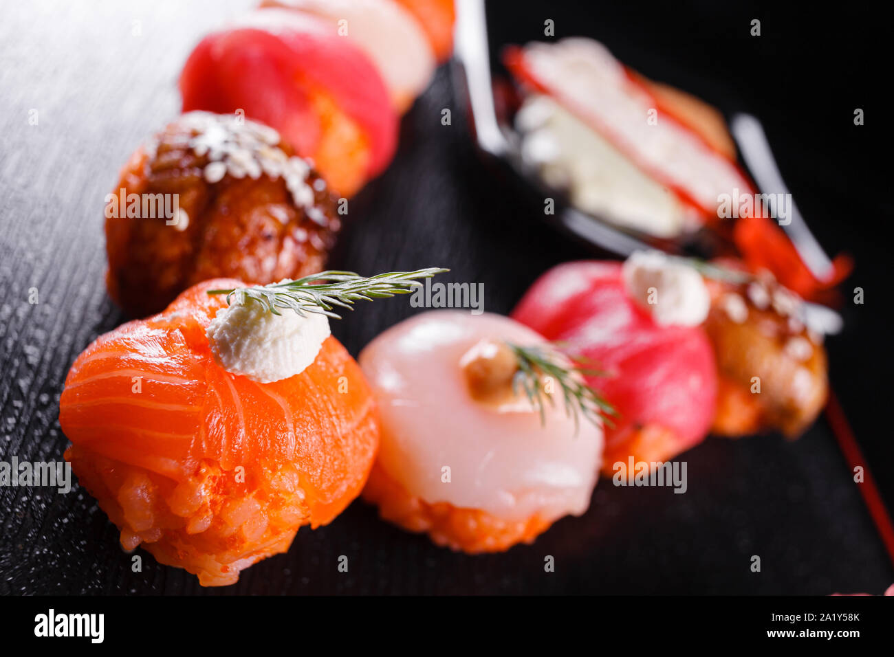 Japanese food, tasty of meal for lunch. Seafood. Sushi with eel, salmon