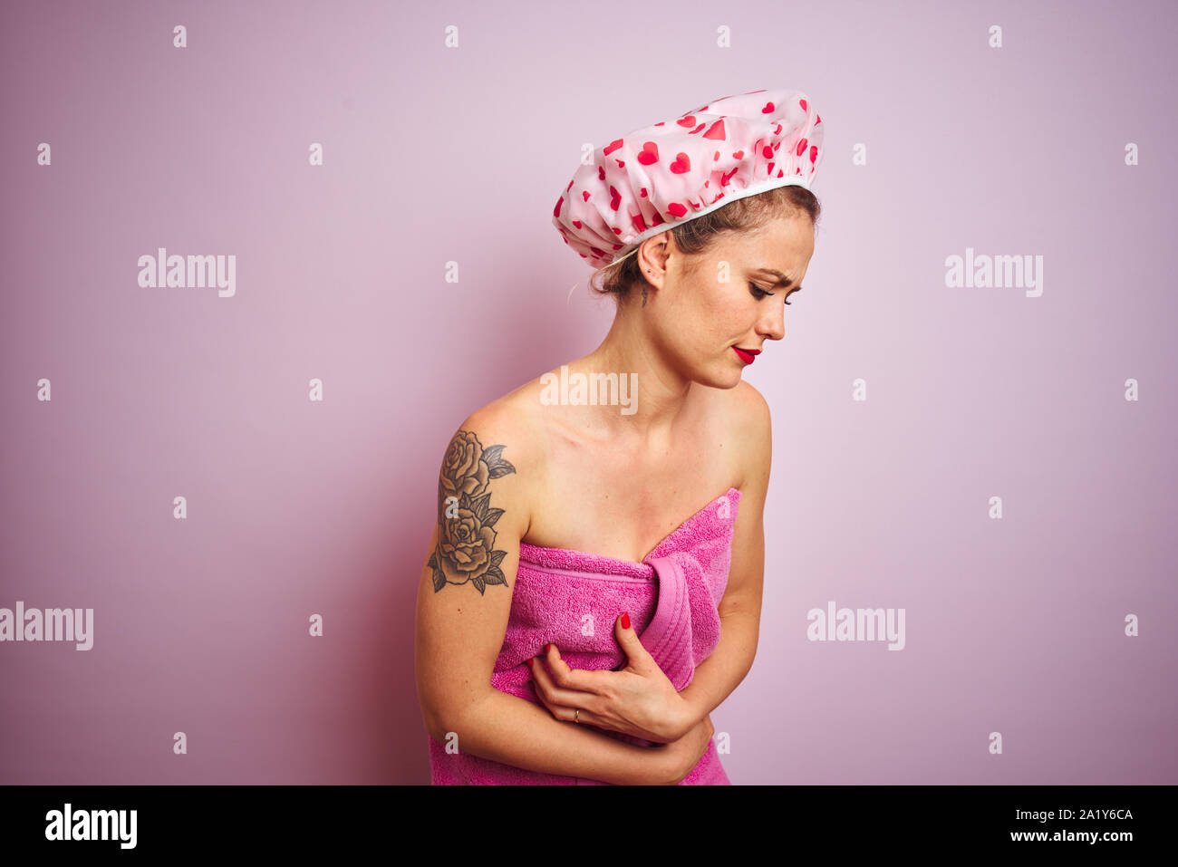 Young beautiful woman wearing towel and 