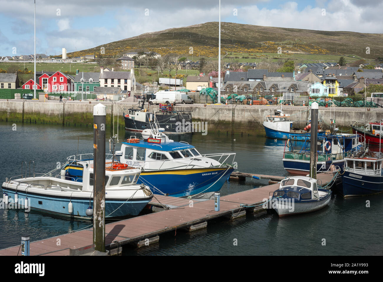Dingle Ireland moored yachts and motorboats in the harbour, Dingle, County Kerry, Ireland Stock Photo