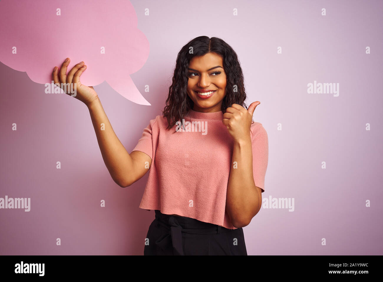 Transsexual Transgender Woman Holding Speech Cloud Bubble Over Isolated Pink Background Pointing 6011