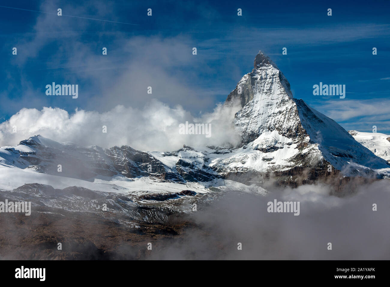 panorama view of Matterhorn behind the clouds Stock Photo