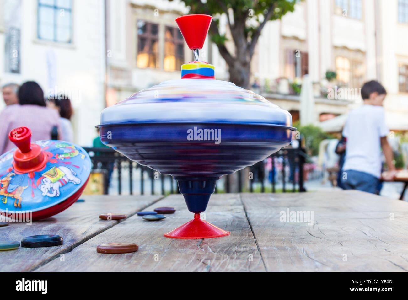 Spinning top toys hi-res stock photography and images - Page 3 - Alamy display picture 1